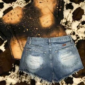Size medium women Jean shorts. Hand distressed